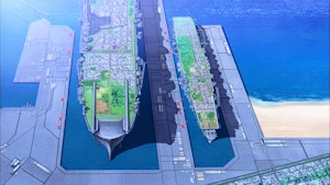 巨大なグロリアーナの学園艦（左）